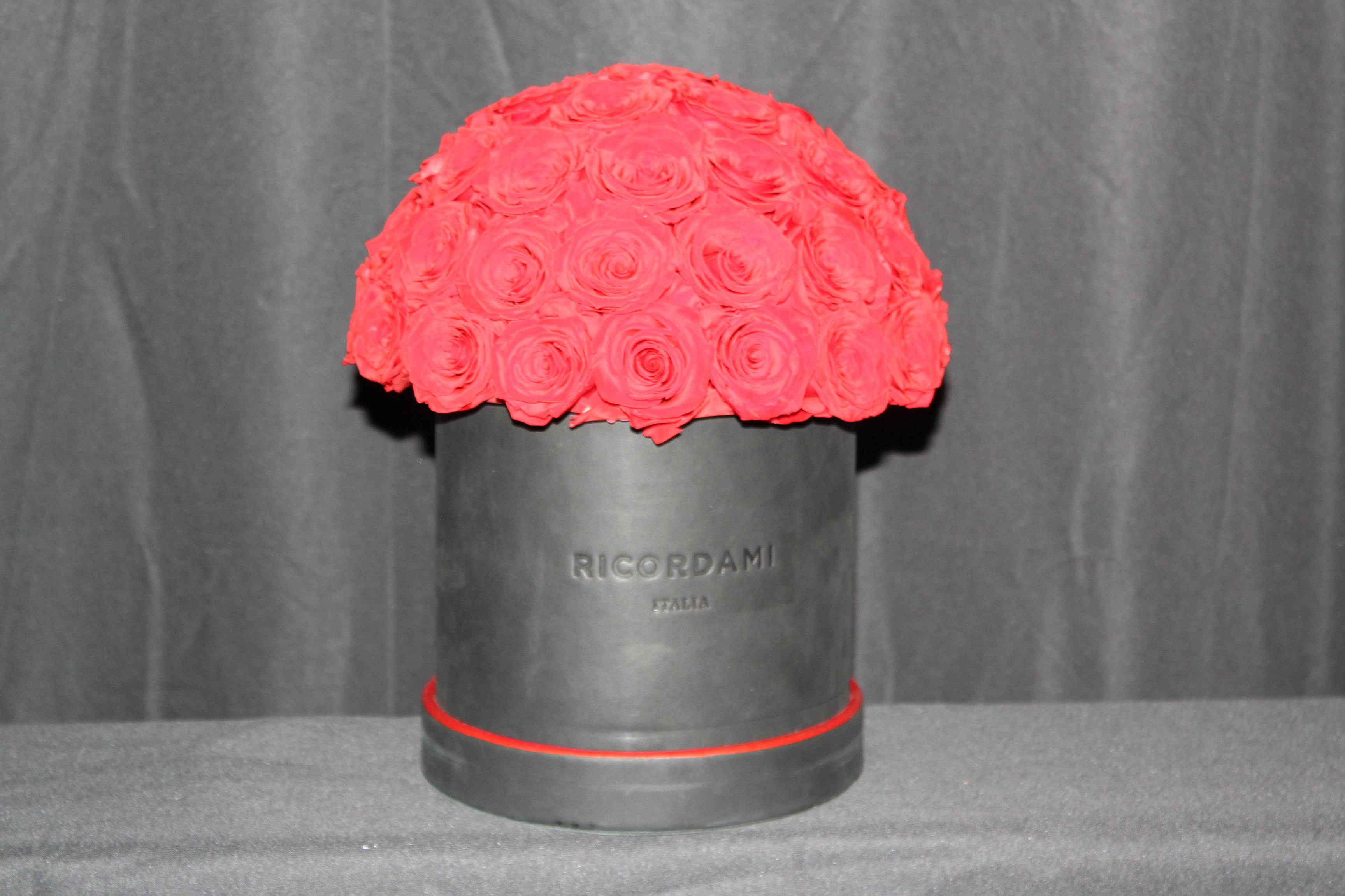 Small red roses · black base