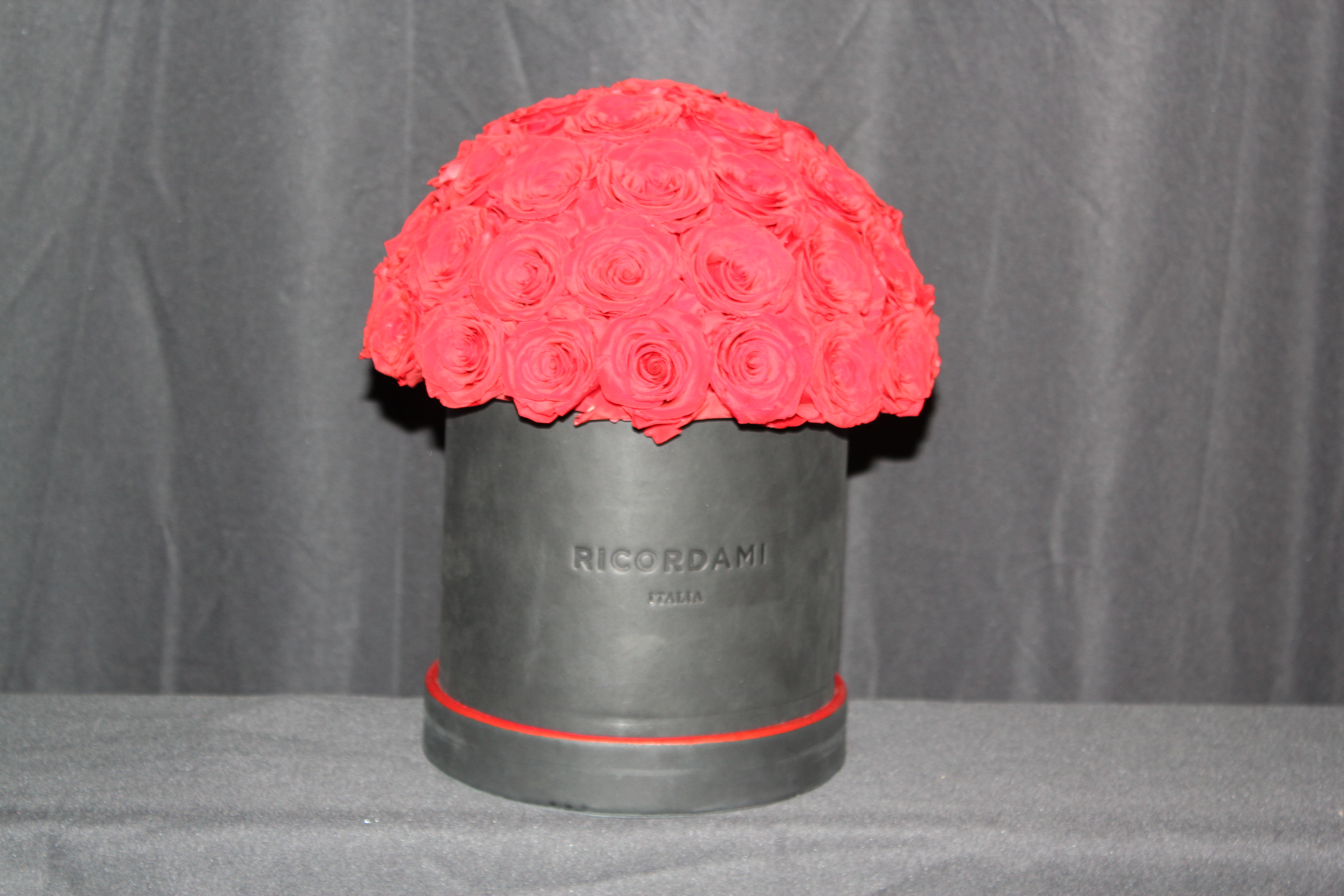 Small red roses · black base