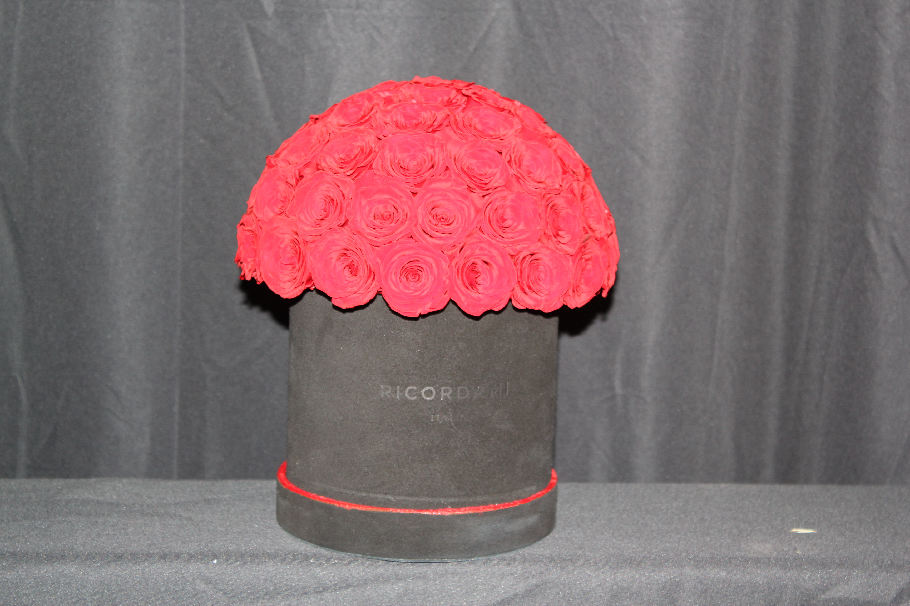 Small red roses · black base