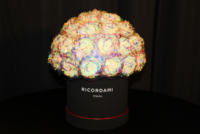 Small arrangement of artificial iridescent Galaxy roses; actual collection photograph