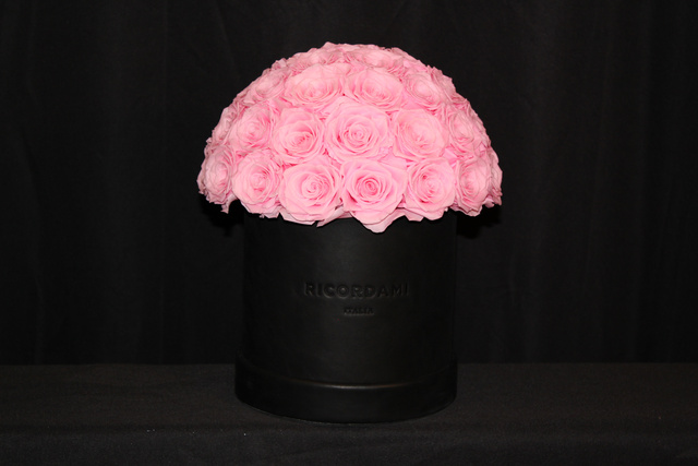 Small pink roses · black base