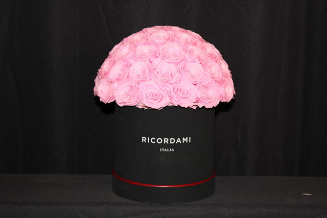 Small pink roses · black base